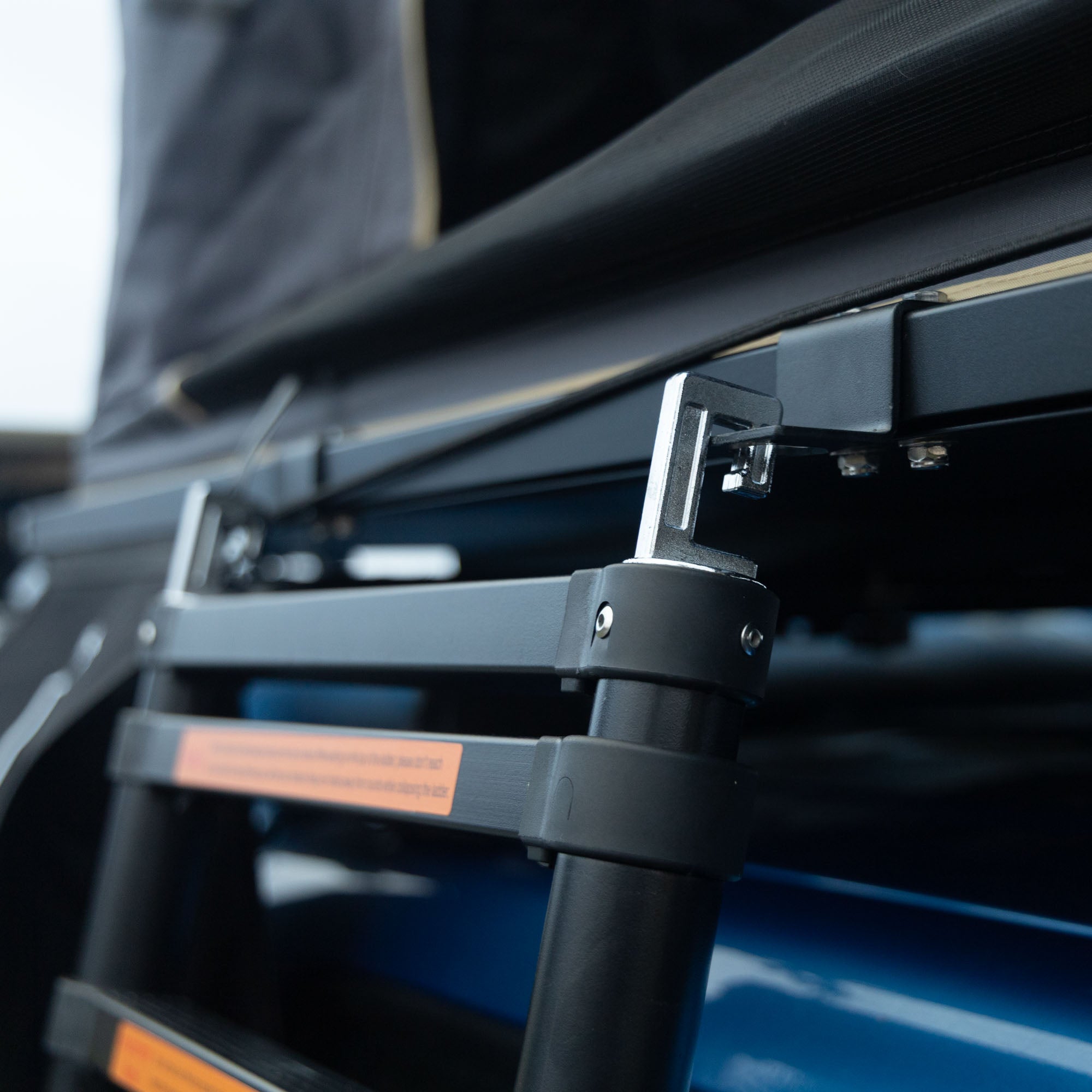 Ladder attached to a hardhshell rooftop tent in rotorua