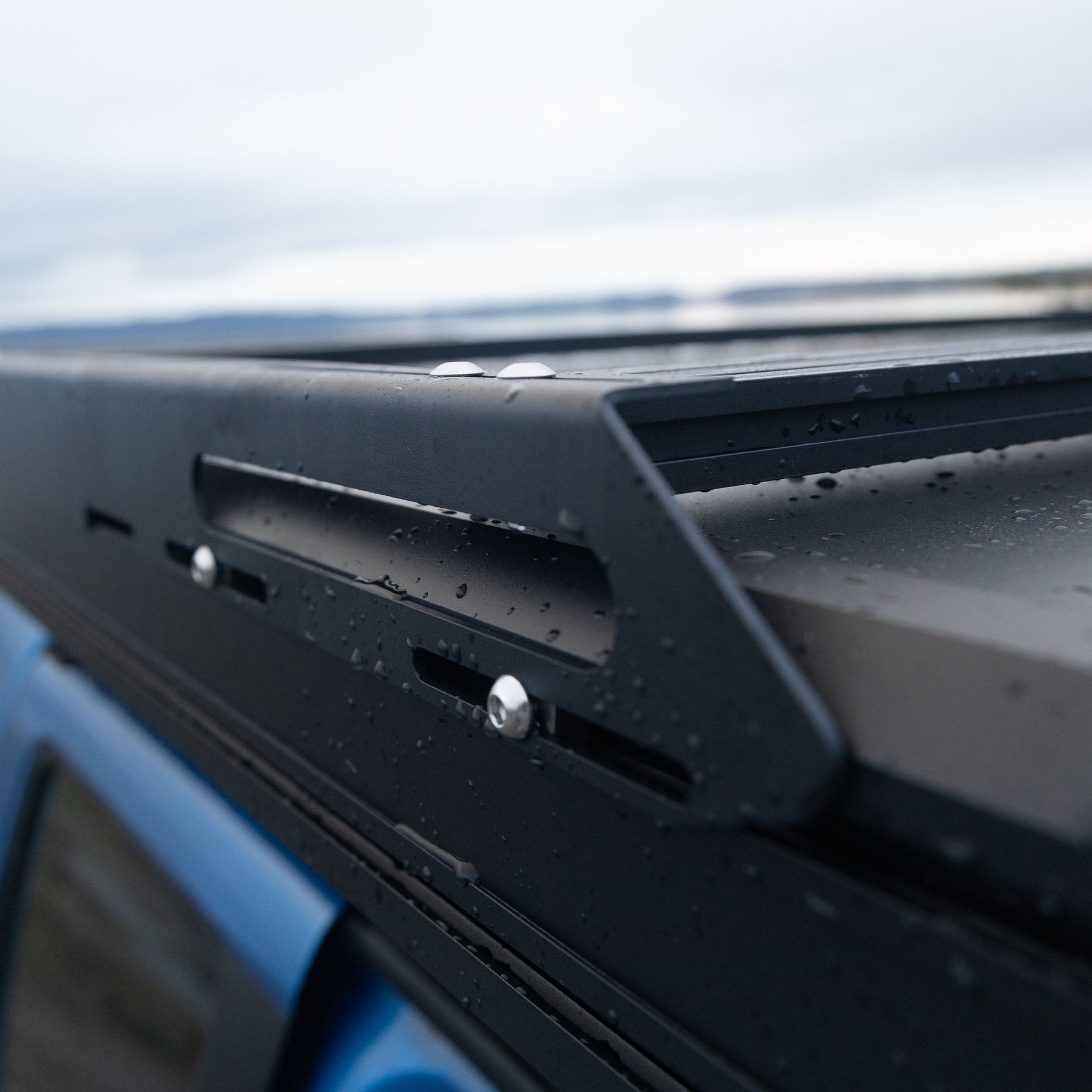 The many bolts holding the hardshell roof racks on