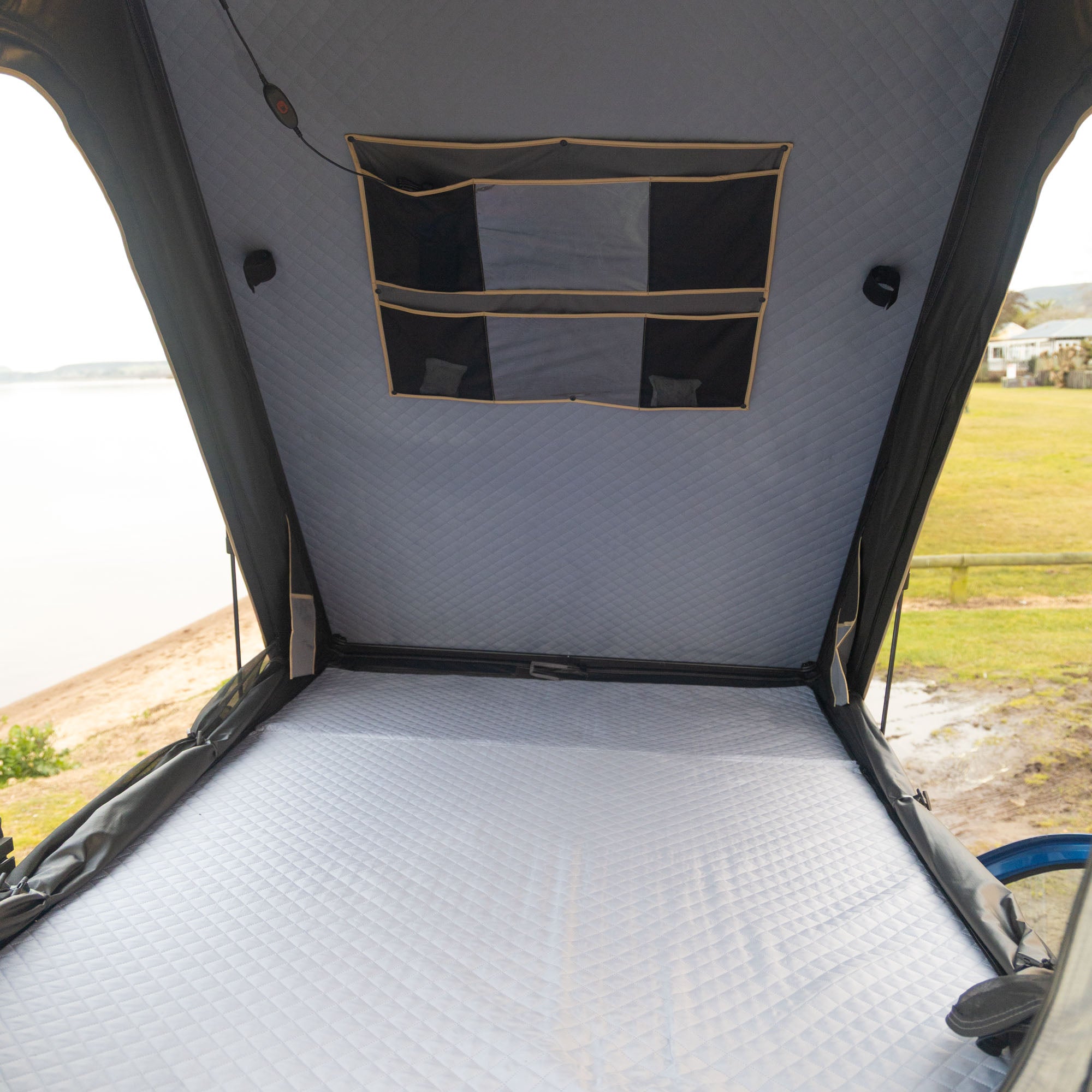 inside a steezy kiwi hardshell rooftop tent